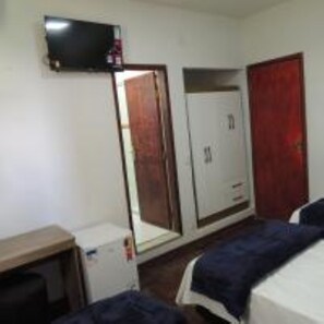 Quarto triplo luxo | Escrivaninha, Wi-Fi de cortesia