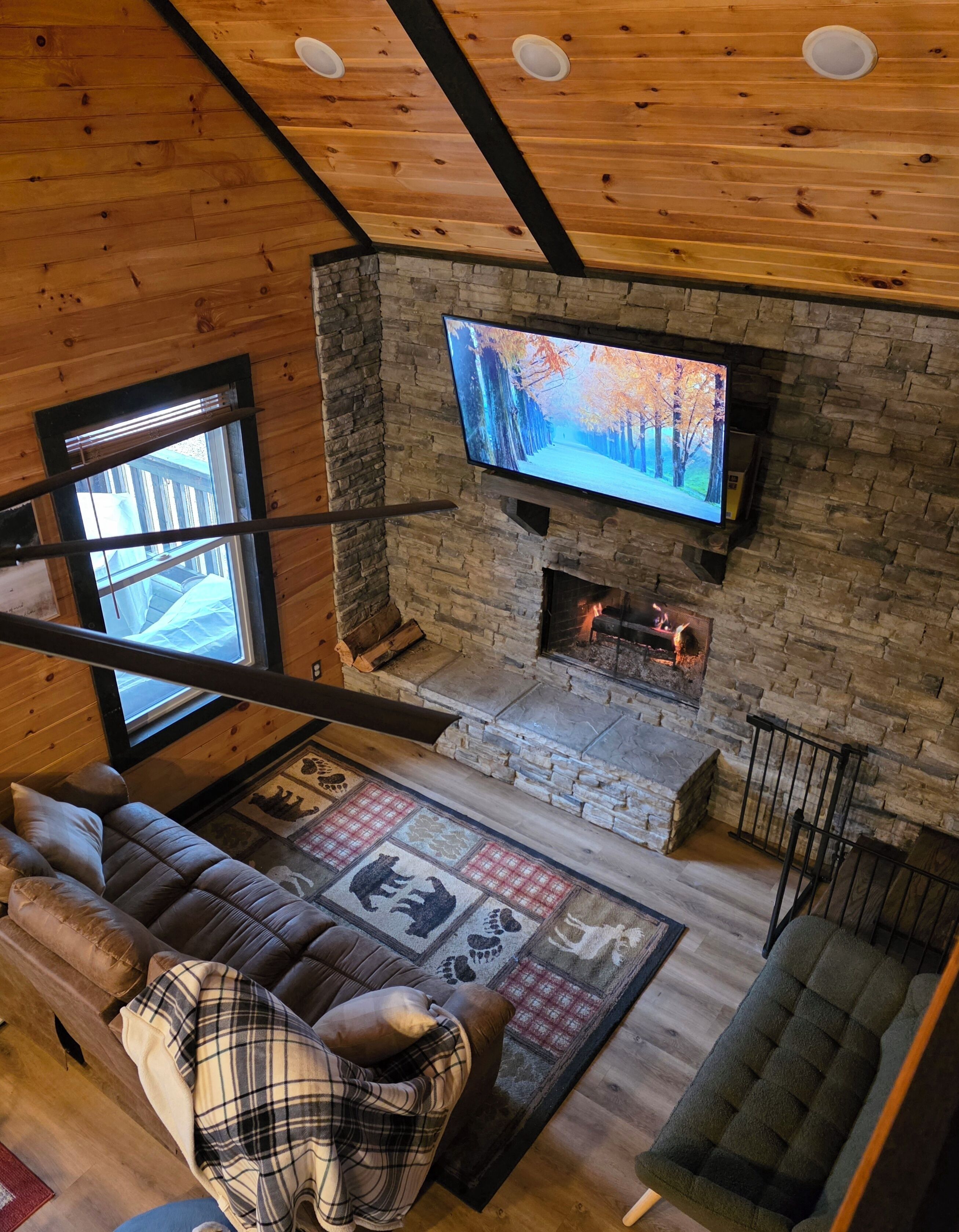 Smart TV, fireplace, foosball, books