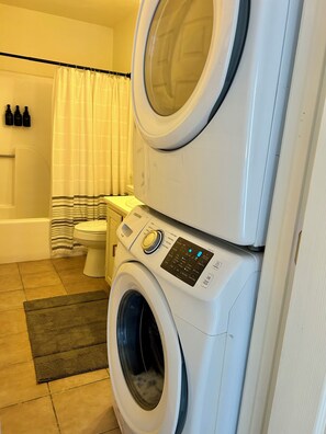 Hair dryer, towels, soap, toilet paper