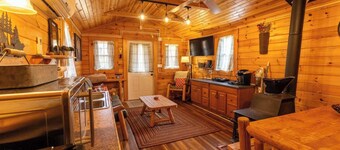 Enjoy this cabin/tiny home on 24 acres of Oak and Hickory forest close to Berkeley Springs, WV