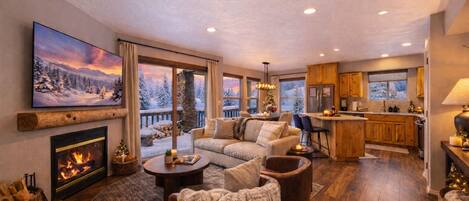 Smart TV, chimenea, mesa de ping pong, libros