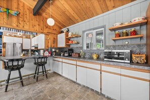 Fridge, microwave, oven, stovetop - The Nest - Retro Cabin w/ Sauna (Rocky View County)