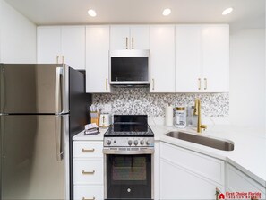 Fridge, microwave, oven, stovetop - Oceanfront Condo ~ Heated Pool ~ Nice Décor! (Saint Augustine)