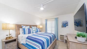 Tabla de planchar con plancha, wifi gratis y ropa de cama