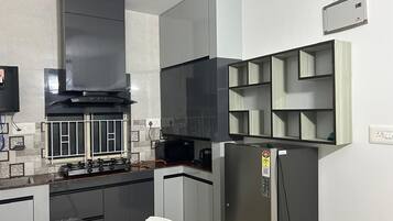 Family Apartment, 1 Bedroom, Balcony | Living area | 32-inch LED TV with digital channels, Netflix, streaming services