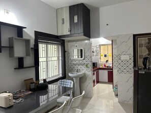 Deluxe-Apartment, 1 Schlafzimmer, Balkon | Wohnbereich