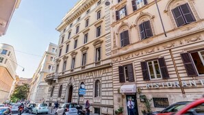 A street view with a building labeled "Da Giovanni" and "Ristorante" on the ground floor. - Roman Holiday Republic (Roma)