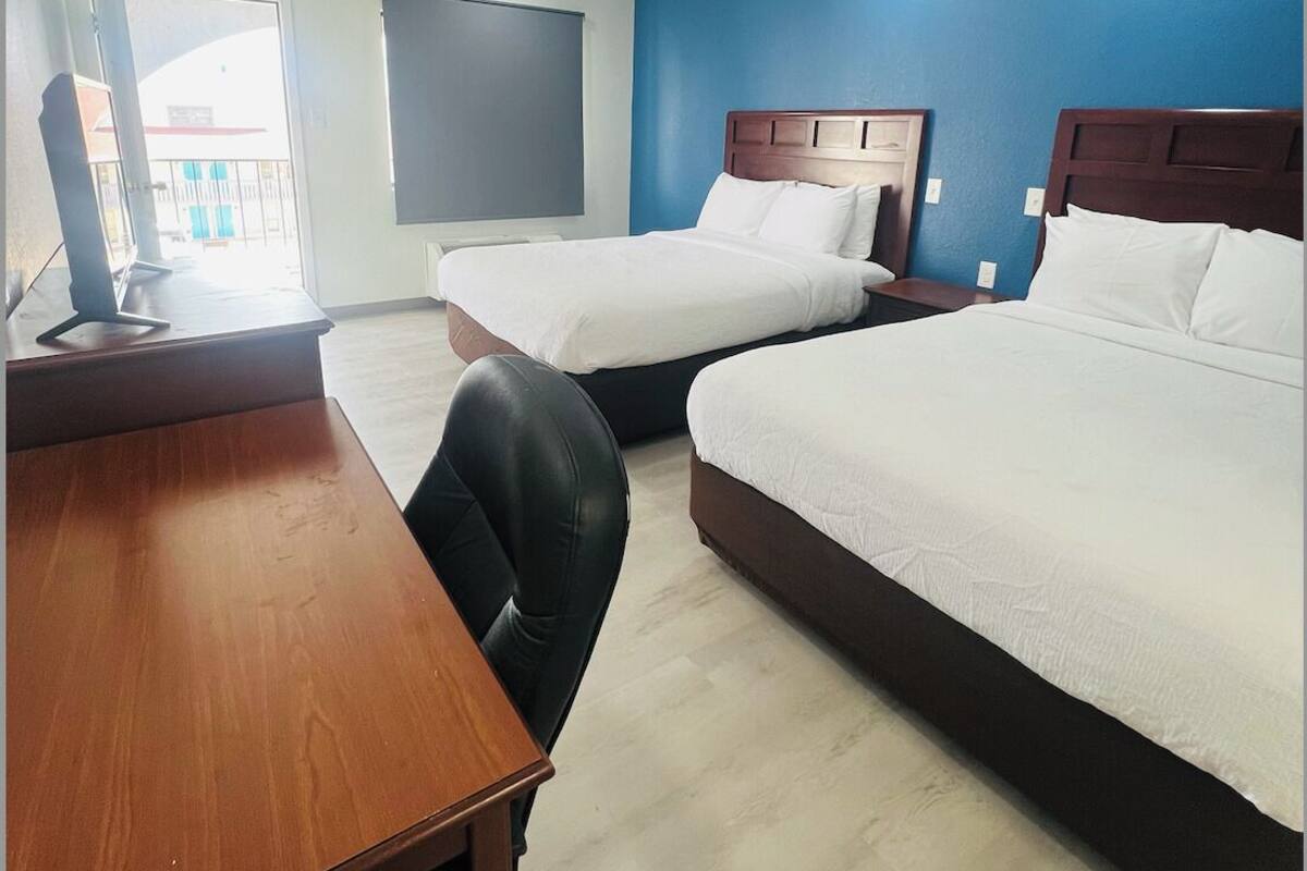 Standard Double Room, 2 Queen Beds, Non Smoking, Housekeeping | Desk, laptop workspace, iron/ironing board