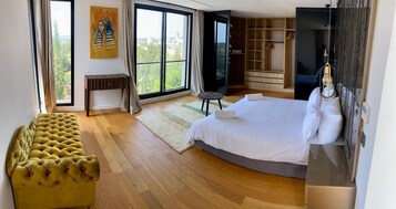 Luxury Villa, Balcony, Courtyard View | Premium bedding, in-room safe, individually decorated