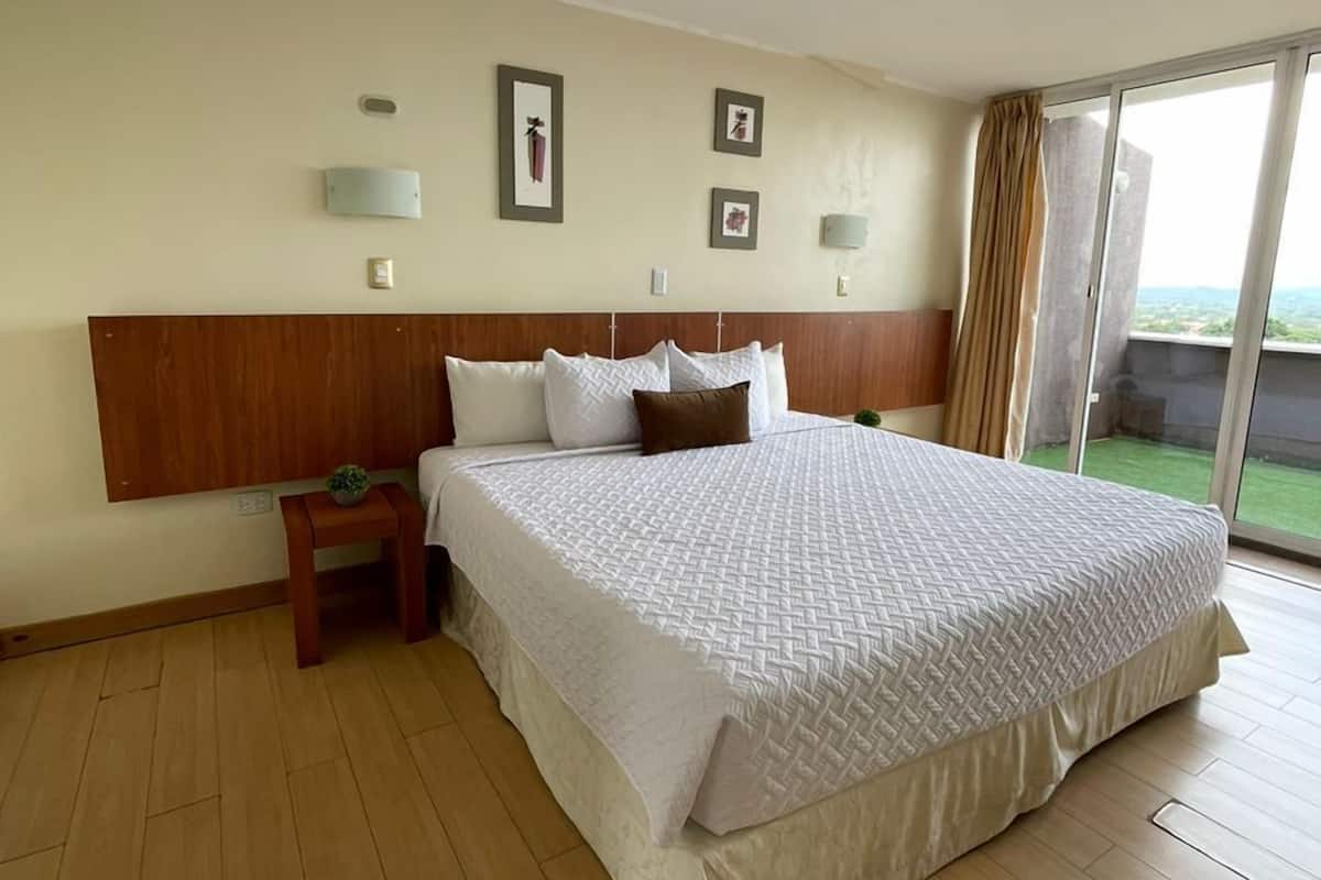 Comfort Suite, Balcony, Mountain View | In-room safe, desk, laptop workspace, iron/ironing board