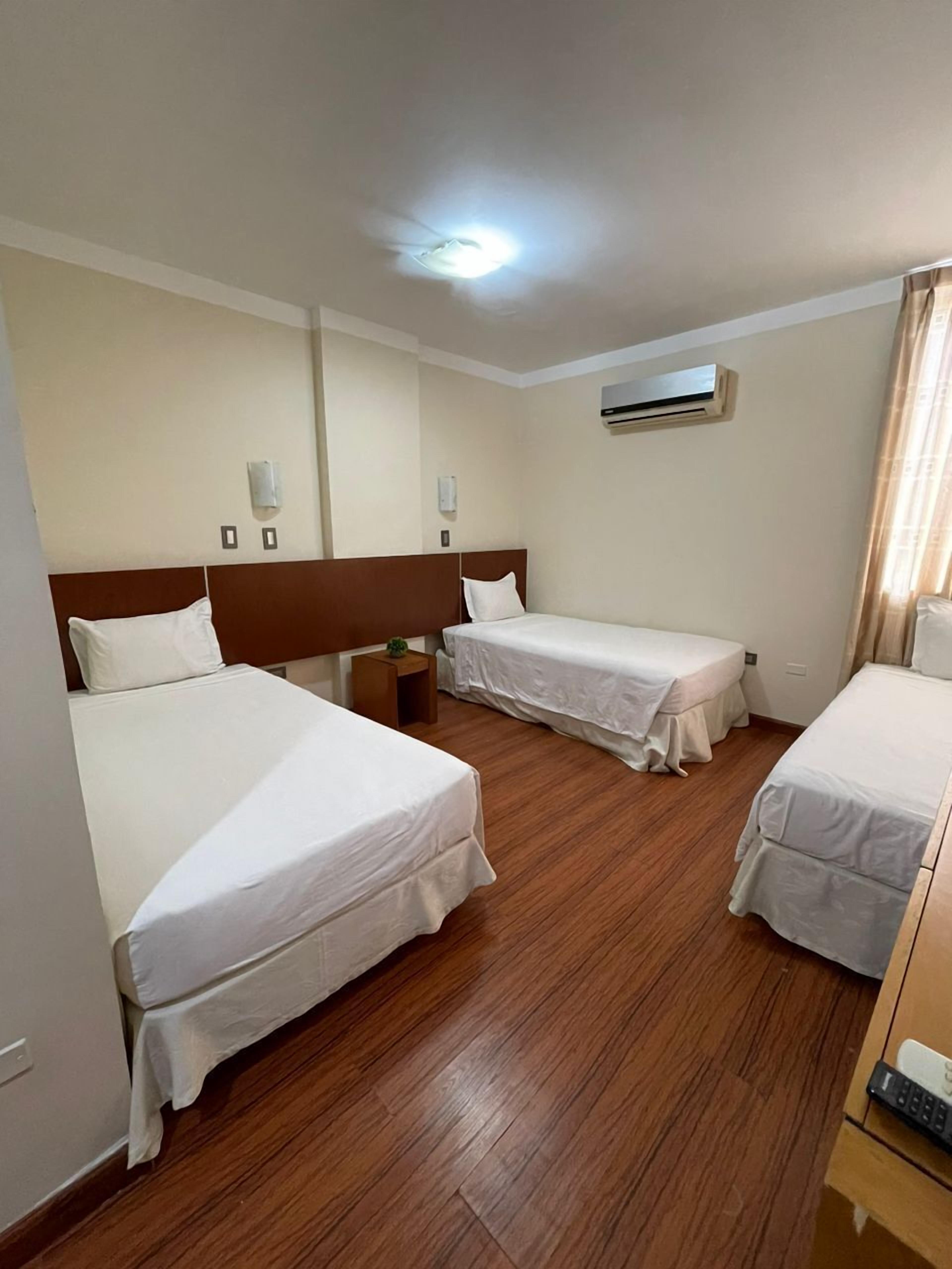 Comfort Triple Room, Courtyard View | Premium bedding, down comforters, pillowtop beds, in-room safe