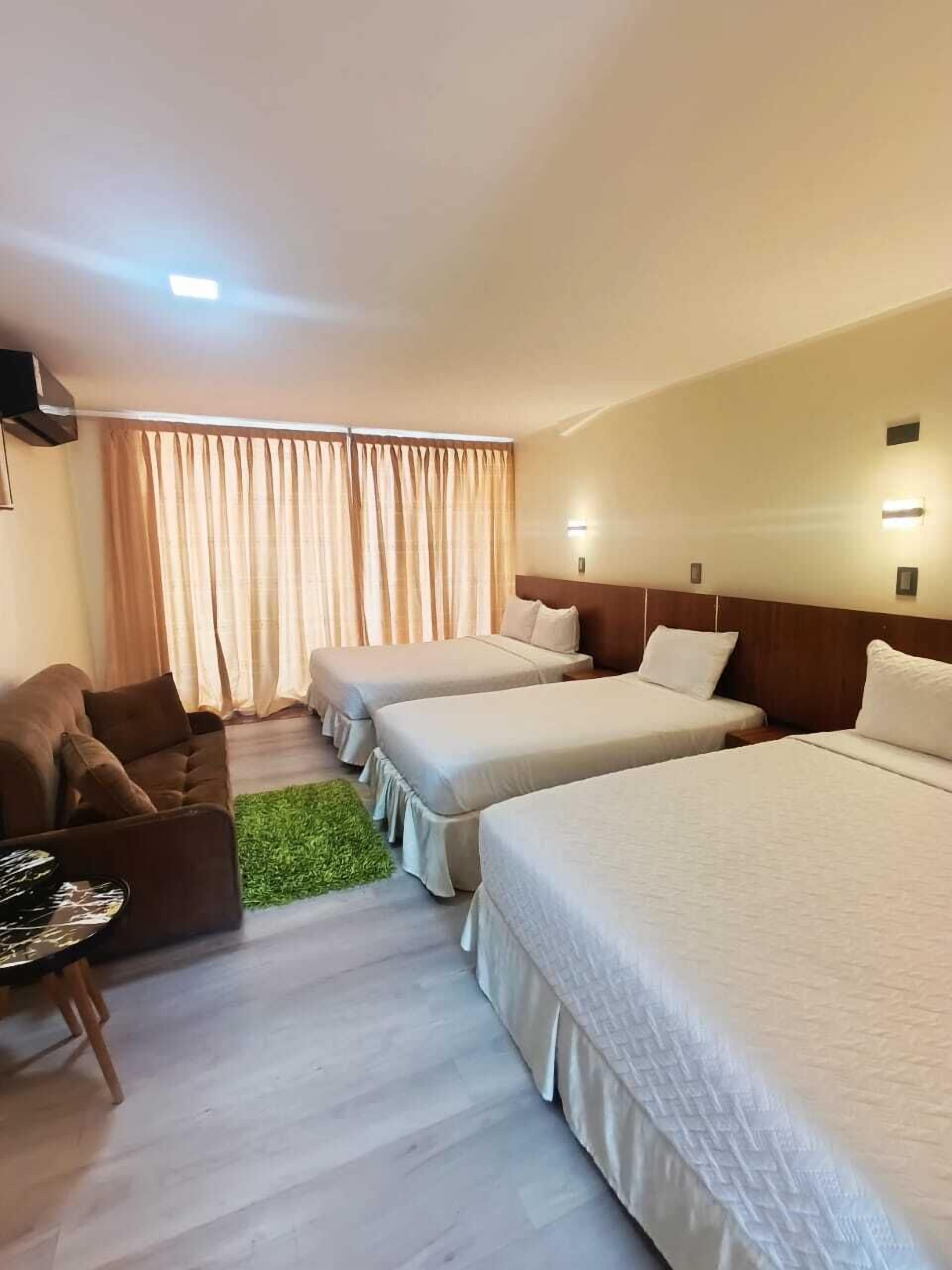 Familiesuite, balkong, fjellutsikt | Sengetøy av topp kvalitet, dundyner og senger med overmadrass