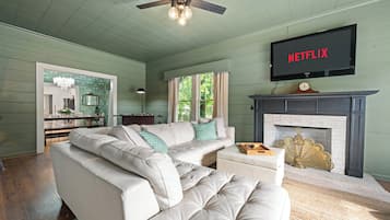Smart TV, fireplace, foosball, books