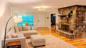 TV, fireplace, books