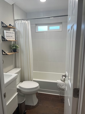 Hair dryer, towels, soap, shampoo