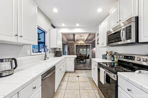 Parrilla de estufa y lavavajillas 