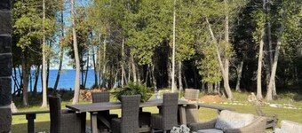 Cozy Lake Home Located on Marquette Island Surrounded by Water Beautiful Sunsets