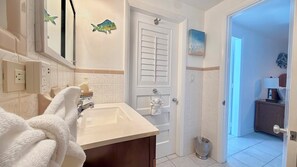 Hair dryer, towels, soap, shampoo