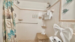 Hair dryer, towels, soap, shampoo