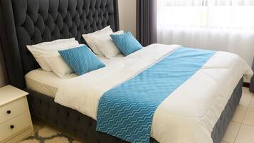 1 dormitorio, tabla de planchar con plancha, wifi y ropa de cama