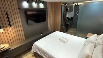 Apartamento | Cortinas blackout, ferros/tábuas de passar roupa, Wi-Fi de cortesia