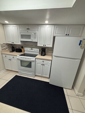 Microwave, oven, stovetop, dishwasher - Two-bedroom beach condominium in Indian Shores, FL (Indian Rocks Beach)