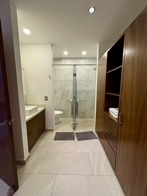 Hair dryer, towels, soap, shampoo