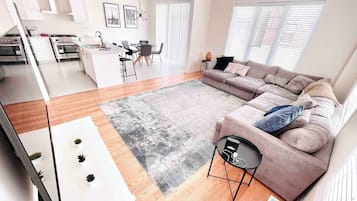 Deluxe House | Living area | Flat-screen TV