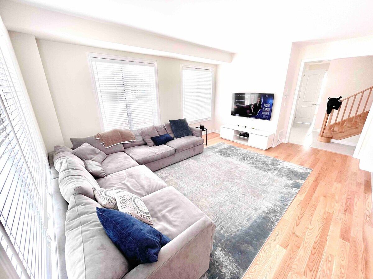 Maison Deluxe | Aire de séjour | Téléviseur à écran plat