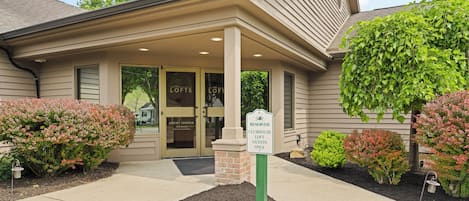 A building with a sign indicating it's a clubhouse for loft guests only.