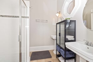 Shower, hair dryer, towels, soap