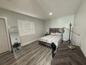 1 bedroom, desk, iron/ironing board, travel cot