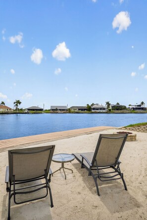 Terrace/patio - The Cape Escape! Waterfront/heated pool/hot tub/sunsets; Burnt Store Area! (Cape Coral)