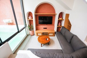 Villa de lujo, para no fumadores, vista a la alberca | Área de sala de estar