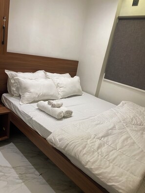 Blackout curtains, iron/ironing board, free WiFi
