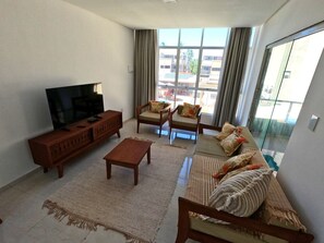 Villa | Área de sala de estar | Televisión de pantalla plana 