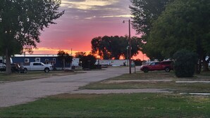 A residential street with parked cars and houses. - Explore the Owyhee River, Leslie's gultch,  Three Forks, lava tubes and more. (Jordan Valley)