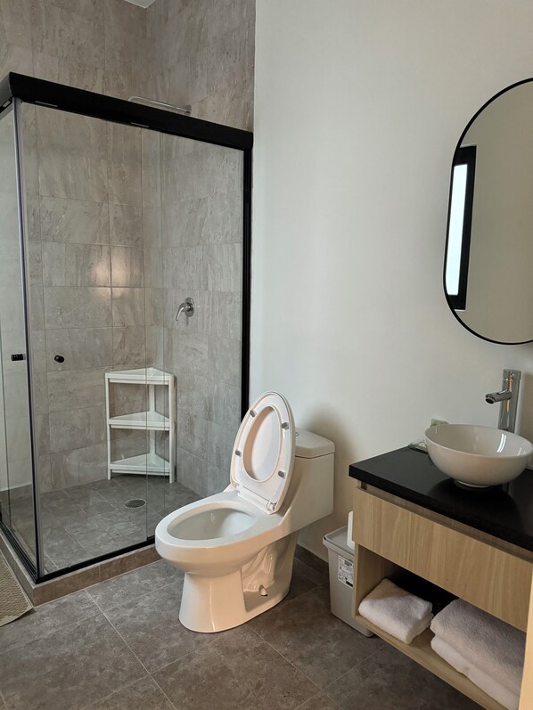 Shower, hair dryer, towels, soap
