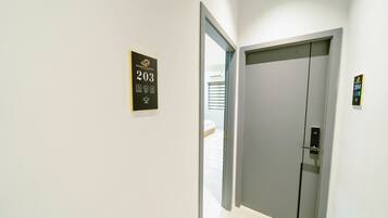 Deluxe Double or Twin Room, Multiple Beds, City View | In-room safe, individually decorated, individually furnished, desk