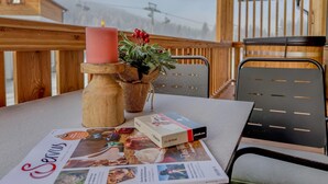 Outdoor dining - Luxurious apartment with a sauna on the slope (Weißpriach)