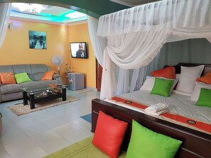 Habitación doble Deluxe, vista al jardín | Wifi gratis y ropa de cama