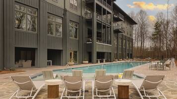 Seasonal outdoor pool, pool loungers