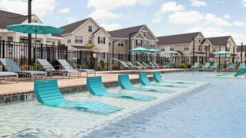 Seasonal outdoor pool, pool loungers