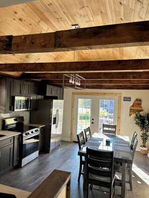 Microwave, oven, stovetop, dishwasher - 3-bedroom House with River View in the Center of Town (Machias)