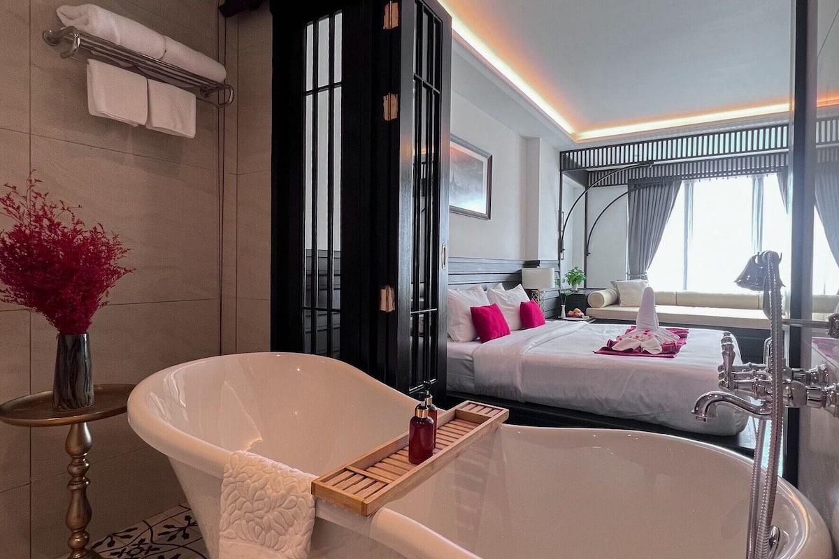 Habitación Deluxe con 1 cama doble o 2 individuales | Caja fuerte, escritorio, cortinas opacas y wifi gratis