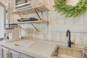 Fridge, microwave, coffee/tea maker, toaster