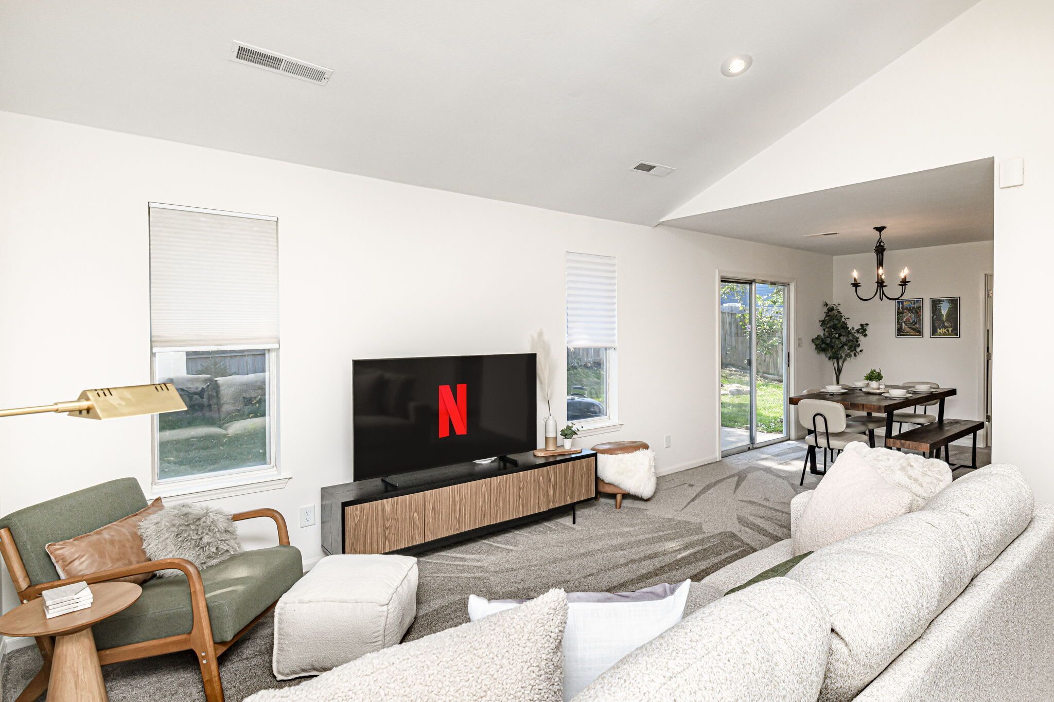 Warning: our living room may cause excessive lounging. Cushy couches, cozy vibes, and a space that feels like vacation the second you walk in.