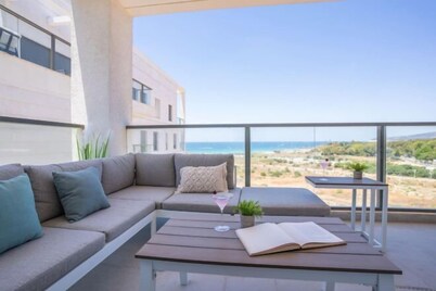 Stylish Seaside Escape with Balcony