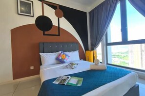 A hotel room with a large bed, a view of the city, and a modern design. - Elysia Park Homestay ByStay (Iskandar Puteri)