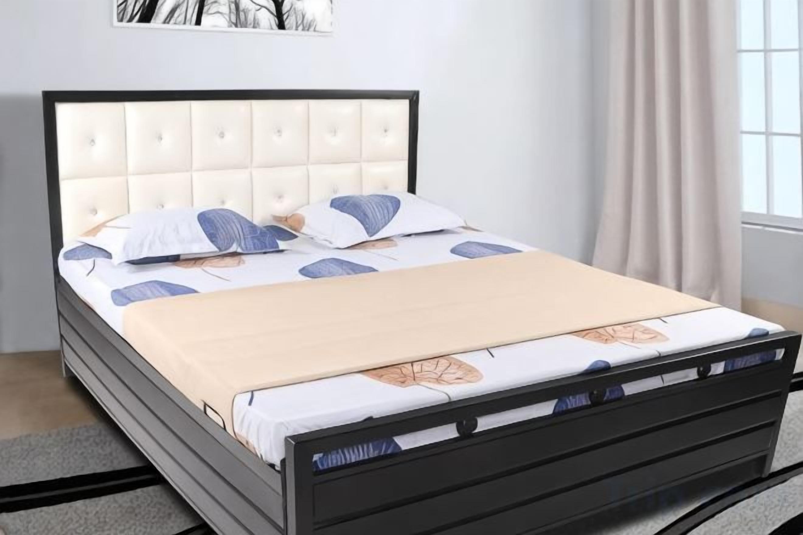A bed with a tufted headboard, white bedding, and a beige throw blanket.